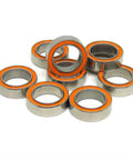 10 Piece Slick Hybrid Ceramic Ball Bearings SMR148C 8x14x4mm Abec 7 Shielded Rings stacked with orange rings for smooth operation.