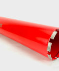 Red 4-inch diamond wet core drill bit, side view, with 1-1/4 inch threaded shank for concrete and masonry drilling