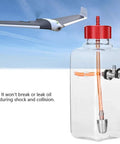 RC Fuel Tank For Airplanes 300ml Transparent Plastic Tank With CNC Machined Metal Cap shown in detail with airplane backdrop.
