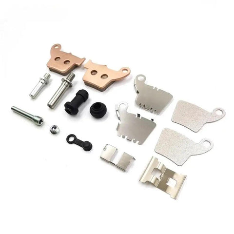 Premium Motorcycle Front And Rear Brake Caliper Repair Kit With Pins, Springs And Pads For Off Road Dirt Bikes, Delivers Strong Braking, Easy Fit, Durable Construction, Ideal Upgrade For Caliper Maintenance And Braking Stability. Front and rear caliper parts, pins, springs, pads, metal hardware, white background.