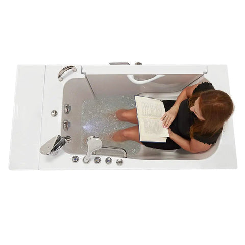 Sleek 32X52 Acrylic Transfer Walk In Tub With Heavy Duty Hydro Massage And Microbubble Jets, person reading inside.