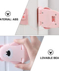 Bear Shaped Safety Locks For Drawers And Cabinets, non marking adhesive, pink ABS lock installation on cabinet.