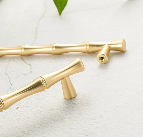 Bamboo Shape Solid Zinc Alloy Cabinet Knobs Set Of 6 In Golden Finish, showing close-up of two affordably chic handles.