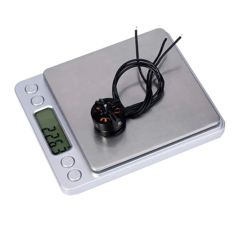BE1806 2300KV Brushless Motor Race Edition For Micro Drones And Tiny Multicopters Size 160 To 210 on a scale, 18g weight
