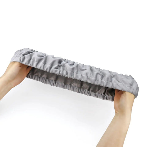 No Slip Bar Stool Base Ring Pads For Round Bases held by hands, showcasing stretchability for 14.5 to 16.5 inch chair bases.