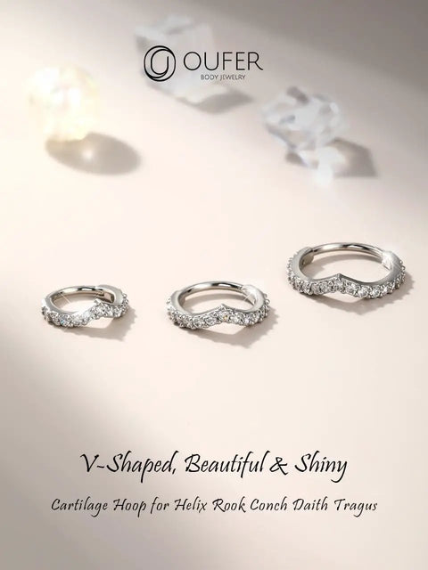 Three 16G Helix Earrings With V Shaped CZ Inlay 316L Surgical Steel on display for Helix Conch Daith Piercings
