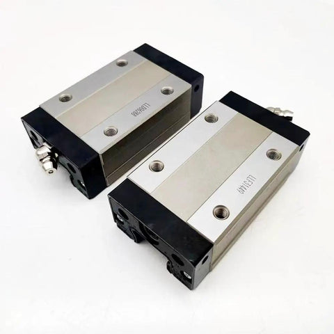 SHS20 Series Linear Carriage Block For CNC Machines And Motion Systems, Handles SHS20V SHS20VUU SS And SHS20V1UU SS, High-Precision Guide Slider For Ultra Smooth, Rock Solid Linear Motion And Easy Maintenance., two steel linear carriage blocks with mounting holes
