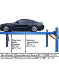 Commercial 4 Post Vehicle Alignment Lift With Heavy Duty Rotating Platforms And Secure Grip Flooring Designed For Daily Shop Use Delivers Rock Solid 14000 Lb Capacity Plus Generous Overhead Clearances And Hassle Free Controls showing a black vehicle in lifted position.