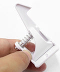 Close-up of 16 Pieces Safety Cabinet Locks For Dresser And Cupboard In White ABS Kidproof And Babyproof Furniture Locks.