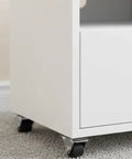 20Lots Furniture Casters, Bottom Mounted for Secure Installation on white cabinet with small black wheels on carpet.