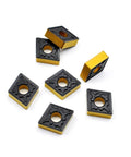 CNMG carbide turning inserts, square with central hole, yellow sides and black top, 7 pieces