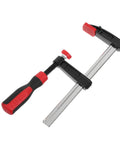 Heavy Duty 2 Inch Throat F Clamp With Solid Iron Bar For Woodworking And Welding Jobs Featuring Smooth One Handed Grip Anti Rust Coating shown with ergonomic handle