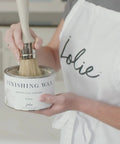 Finishing Wax Top Coat For Furniture And Cabinets Use On Interior Walls And Home Decor Odorless And Non Hazardous Clear Water Resistant Chalk Finish Wax 500 ml being applied with brush