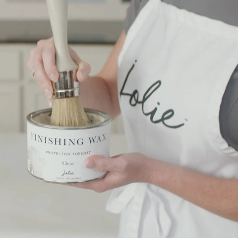 Finishing Wax Top Coat For Furniture And Cabinets Use On Interior Walls And Home Decor Odorless And Non Hazardous Clear Water Resistant Chalk Finish Wax 500 ml being applied with brush