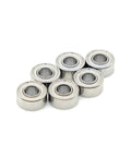 Super Cool Set Of 10 Tiny 2x6x3mm Mini Ball Bearings Made From Super Durable Chrome Steel arranged in a group.