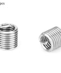 Close-up of two stainless steel M3 x 0.5 threaded inserts from a 30 Piece Thread Repair Kit With Stainless Steel Inserts For Metric And Imperial Threads.