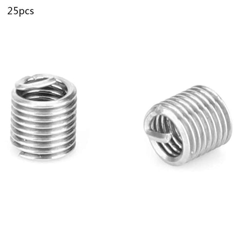 Close-up of two stainless steel M3 x 0.5 threaded inserts from a 30 Piece Thread Repair Kit With Stainless Steel Inserts For Metric And Imperial Threads.