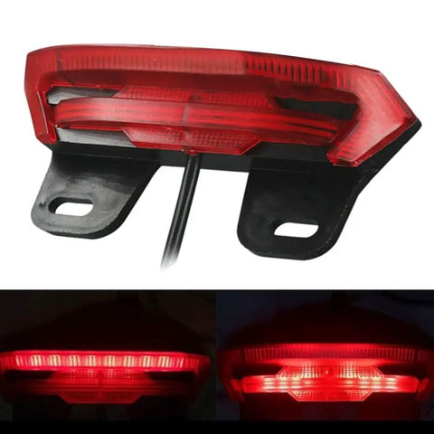 Must-Have Electric Bike Taillight With Bright Led Brake Turn Signals For Superior Night Safety, 36V To 60V Waterproof Rear Light For E-Bikers And Scooter Riders Looking To Boost Visibility Big Time. red LED rear light with black bracket and wire