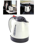 Heavy Duty 24V Electric Kettle For Trucks Built Like A Tank With Auto Shut Off 1 Liter Portable Water Heater in a truck cabin.