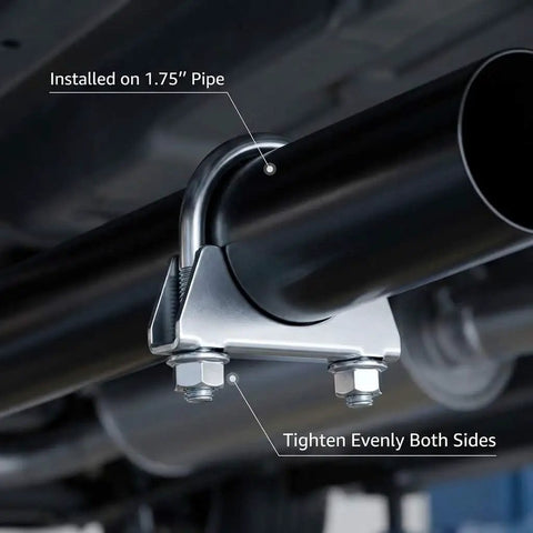 Close-up of U-Bolt Exhaust Clamp 1.75 Inch OD securing exhaust pipe underneath car, universal muffler clamp with zinc finish.