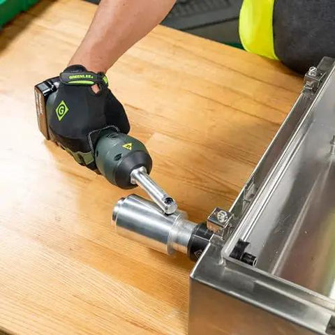 11 Ton Battery Hydraulic Knockout Punch Kit With Slugbuster for half inch to two inch conduits in use on steel surface