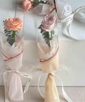 Two bouquets wrapped in Waterproof Flower Wrapping Paper Sheets Pack Of 20 For Floral Bouquets 11.02 By 19.68 Inches