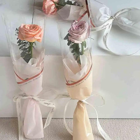 Two bouquets wrapped in Waterproof Flower Wrapping Paper Sheets Pack Of 20 For Floral Bouquets 11.02 By 19.68 Inches