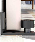 Adjustable Floor Guide For Sliding Barn Doors Black, Wall And Door Bottom Roller Guard installed view on tiled floor