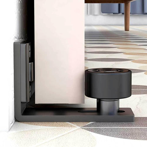 Adjustable Floor Guide For Sliding Barn Doors Black, Wall And Door Bottom Roller Guard installed view on tiled floor
