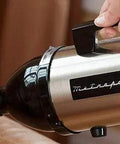 VM6SB500 500W 120V High Performance Hand Vacuum With All Steel Build And Beastly Suction in use on upholstery