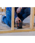 Person using Green Laser Level Kit With Self Leveling 5 Dot GreenBrite Technology on a wooden frame on the job site