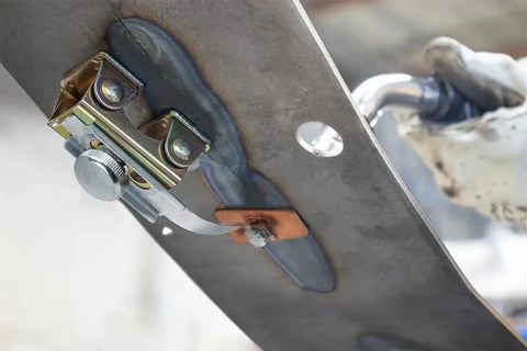 AGK320 Hole Plug Magnet for Hands Free Welding With Pivoting Magnetic V Pad Base attached to steel panel