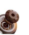 Close-up of 4 Pack Half Inch Rigid Rubber Caster Wheels For Furniture, No Fuss Heavy Duty Silent Fixed Casters, brown detail
