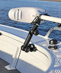 Railblaza Trolling Motor Support XL mounted on boat rail, black adjustable arm with tool-free lock and white motor head.
