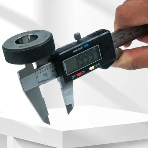 YMGSCC Caliper for Jewelry Metal Measurement measuring a circular metal piece with digital readout display