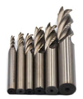 Set of 6 HSS end mills, 4-flute straight cut, sizes 1/8" to 1/2" (silver).