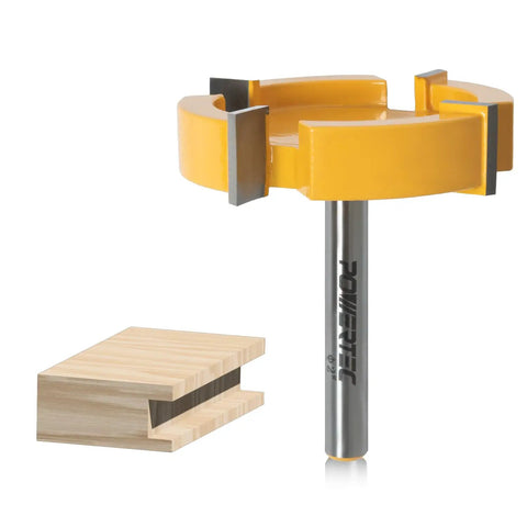 Heavy Hitter Two Inch Slab Flattening Router Bit With Quarter Inch Shank and Sharp Carbide Tips cutting straight through slabs.