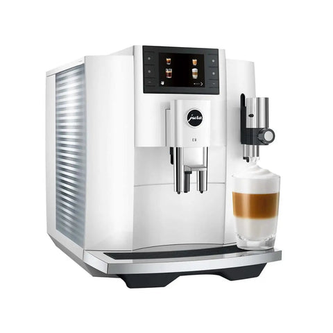 Sweet Renewed Automatic Coffee And Espresso Machine In Piano White delivers a killer 17 drink menu with integrated milk frother.