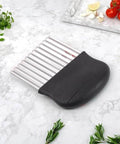 Crinkle cutter with stainless steel blades and black handle; 1-piece kitchen potato and vegetable slicer.