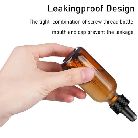 Two Pack Real Deal Amber Glass Dropper Bottles Two Oz With Straightforward Graduated Markings And No Fuss Silicone Caps To Keep Your Favorite Essential Oils Protected From Harsh Sunlight