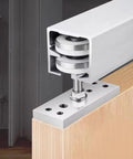 Heavy Duty Folding Door Pulley Featuring Ridiculously Smooth Nylon Rolling Wheel And Rock Solid Zinc Alloy Construction For Zero Hassle Barn Door Hardware Replacement System mounted on wood.