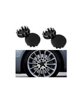 Solid 4 Pack Wheel Center Caps Black 2.36 Outer Diameter 2.2 Inner Diameter Tough ABS on a car wheel hub.