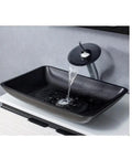 Top Tier Slick Black Rectangular Vessel Sink Built From Heavy Duty Tempered Glass With Smooth Swivel Faucet And Clean Countertop Style For Quick Bathroom Refresh Upgrades with running water.