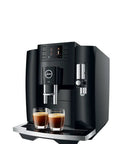Top Shelf Fourth Generation Automatic Coffee Machine In Piano Black with two espresso shots visible in cups, sleek design, and user-friendly interface.