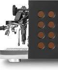 Professional Tca Espresso Machine Featuring Advanced Hybrid Pid Temperature Tuning And Upscale Copper Matte Black Chassis side view showing portafilter and design.