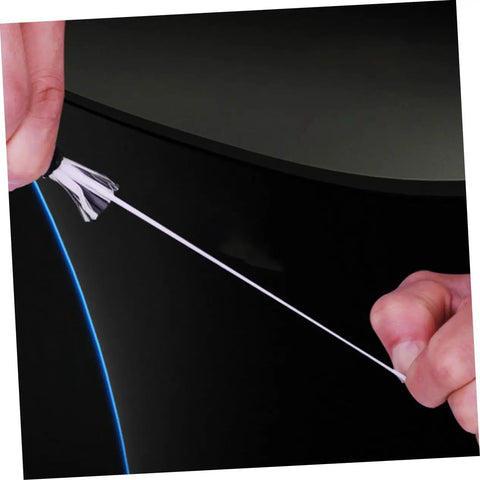 Close-up of hands stretching Elastic Cargo Binding Belt With Quick Release Tensioner For Kayak And Boat Trailers Car Roof Rack Luggage.