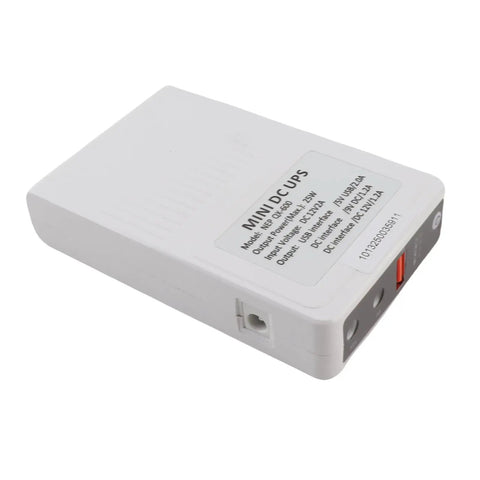 Bad Boy Mini UPS Battery Backup With 8000mAh for routers, compact white design, features input/output ports.