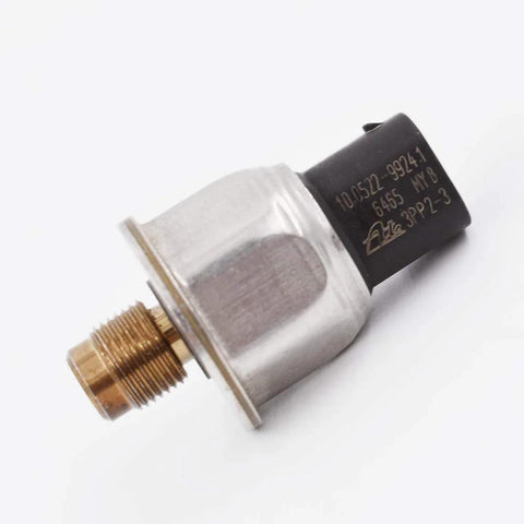 Side view of master cylinder brake fluid pressure sensor; brass threaded connector, silver metal housing, black plastic sensor body.