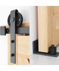 Built Like A Tank 7 Foot Sliding Barn Door Hardware Kit featuring heavy duty steel track and smooth wheel for easy operation.