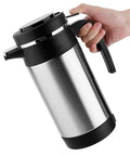 Road Ready Setup 1000 Milliliter Stainless Steel 12 Volt Car Kettle Keeps Brews Piping Hot With A Dripfree Seal and Auto Temp Hold Feature For Long Haul Drives Nationwide, held by hand.